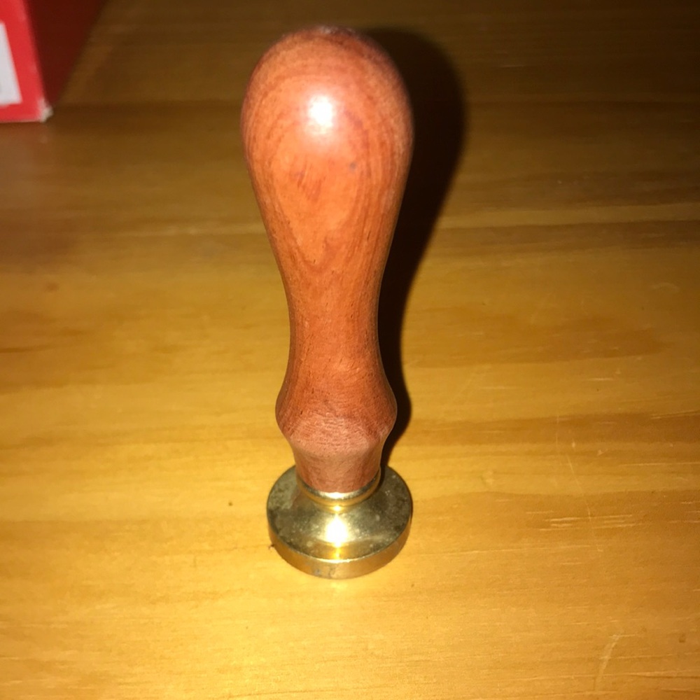 Stamp sealer for envelope